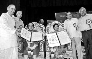 Noted vocalists Sriram Parasuram and Anooradhda Sriram being honoured with the M.S. Subbulakshmi Puraskar at the Visakha Music Academy's 43rd annual festival of music and dance at Kalabharathi in the city on Monday. From left are vocalist Nedunuri Krishna Murthy, Vijay Kumar of Vijay Nirman, VMA sectetary M.S. Srinivas and president S.V. Rangarajan.